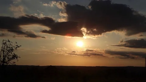 Sunset, sun setting time lapse, time-lapse. Countryside, Farm, Landscape Stock Footage 82972174