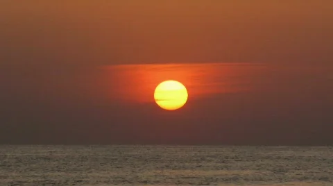 Sunset, the sun sits down the sea Stock Footage 501379