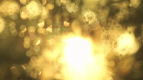 Sunset sunlight and trees bokeh through the rainy faceted window Stock Footage 96427733