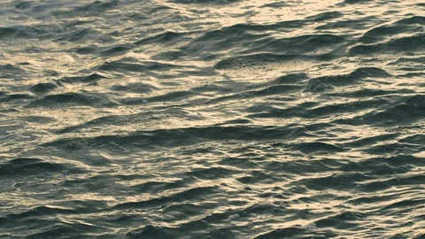 Sunset sunlight reflecting on the sea surface Stock Footage 102169947