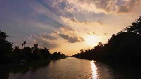 Sunset Sunlight Shining Through Clouds Stock-Footage 343606640