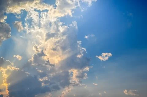 Sunset / sunrise with clouds, light rays Stock Photos