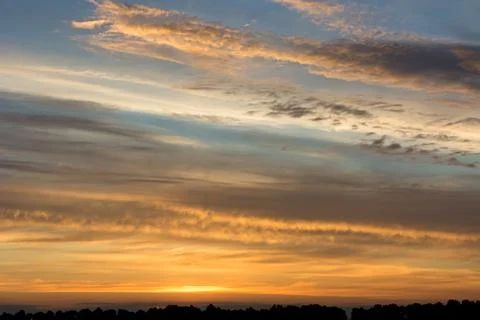 Sunset  sunrise with clouds. Stock Photos