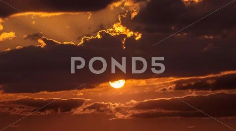 The sunset (sunrise) with clouds Stock Photos