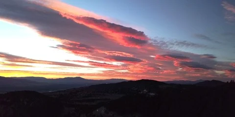 Sunset Sunrise over mountains - static shot Stock Footage 96774005