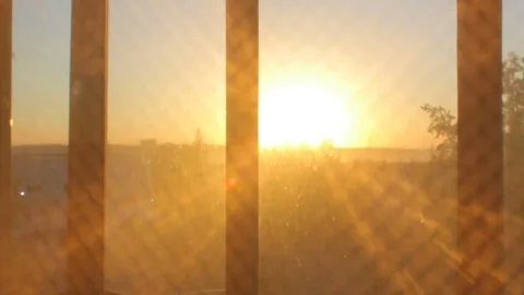 Sunset sunrise view through transparent curtain Stock Footage 76144704