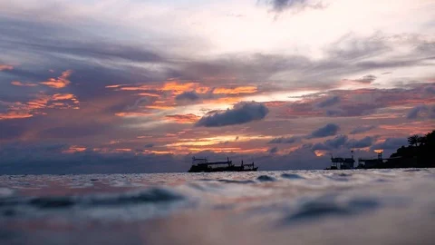 Sunset on the surface of the ocean Stock Footage 105490432