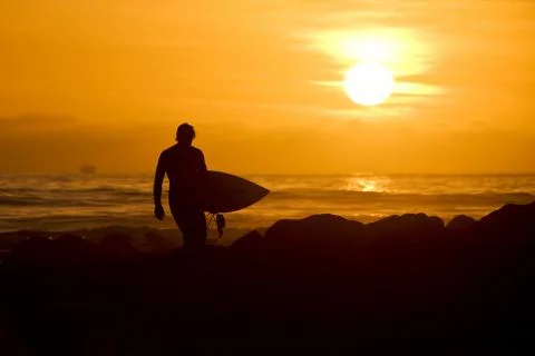 Sunset surfer Stock Photos