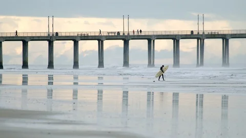 Sunset surfer pier Stock Footage 127867854