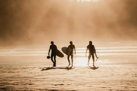 Sunset Surfers Foto stock