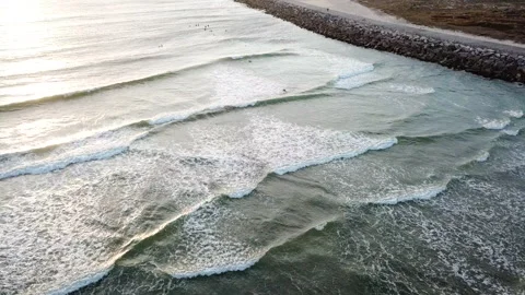 Sunset Surfing 4k Drone Stock Footage 147440181