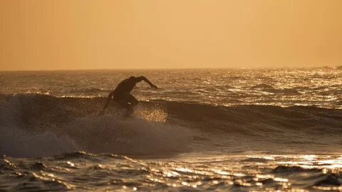Sunset surfing Bali Super Slowmotion Stock Footage 103215918
