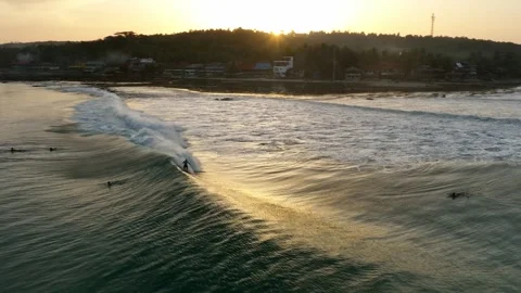 Sunset Surfing Waves Aerial Drone 4K Indonesia Paradise Stock Footage 288567979
