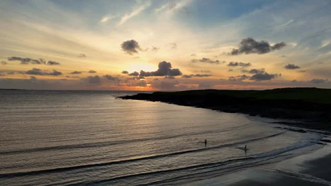 Sunset swimmers Stock Footage 301090701