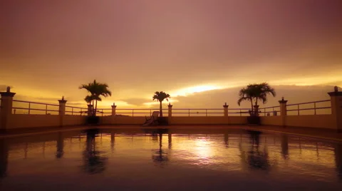 Sunset at swimming pool Stock Footage 54619759