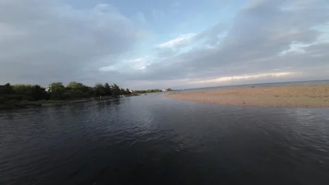 Sunset Symphony: FPV Aerial Drone Showcasing Rhode Island's Beach and Marsh Video stock 243823974
