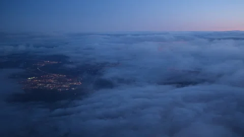 Sunset take off through clouds from Schipol airport - 3840 x 2160 @ 29.97fps Stock Footage 240347343