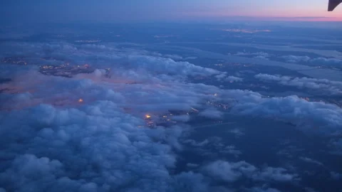 Sunset take off through clouds from Schipol airport - 3840 x 2160 @ 29.97fps Stock Footage 240348199