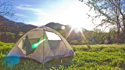 Sunset with Tent in Foreground Timelapse Stock Footage 65053194