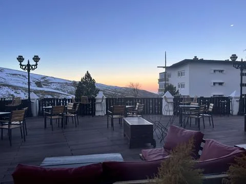 Sunset on a terras in the mountains Stock Photos