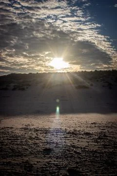 Sunset at Texel beaches with clouds Stock Photos