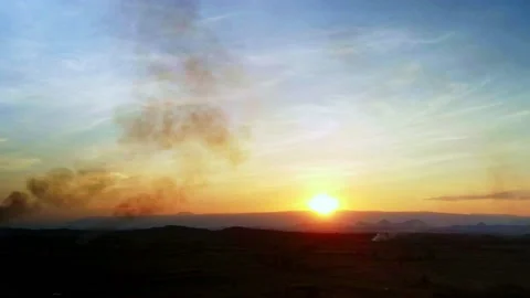 Sunset in Thailand with smoke from fire - HYPERLAPSE Stock Footage 148282211