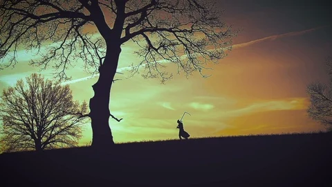 At sunset there is a grim Reaper Stock Footage 90067670