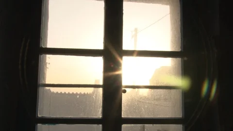 Sunset though a window Stock Footage 87075578