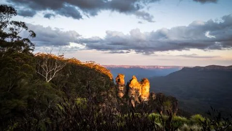 Sunset at the Three Sisters in Blue Mountain, New South Wales, Australia. Stock Photos