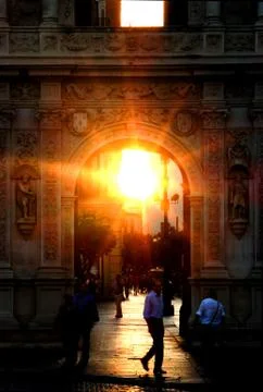 Sunset through arch Stock Photos