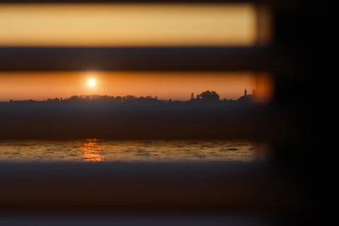 Sunset through the blinds Stock Illustration