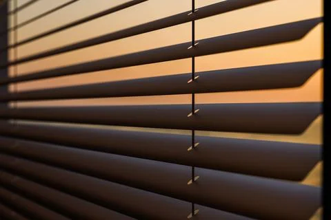 Sunset through the blinds Stock Illustration