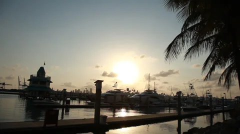 Sunset through boat masts and flying bridges at the marina Stock Footage 39246498