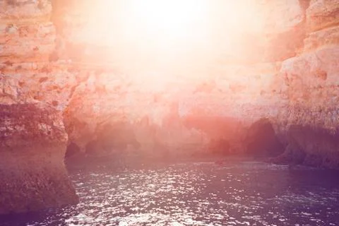 Sunset through the cliffs. Abstract background Stock Photos