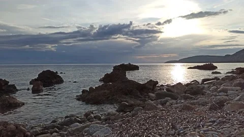 Sunset through clouds, cloudy sky and calms sea. The silence before the storm Stock Footage 141741248