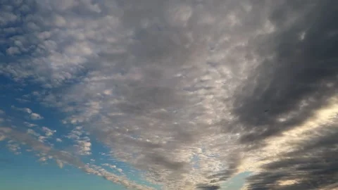 Sunset through the clouds Stock Footage 220364766