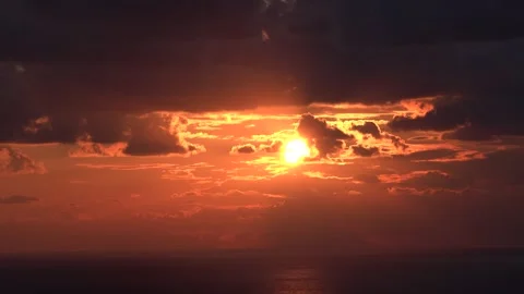 Sunset through the clouds over the sea in fast motion 스톡 동영상 245829878