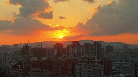 Sunset Through the Clouds Over Taipei Stock Footage 331528743