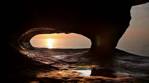 Sunset through coastal cave Stock Footage 55013286