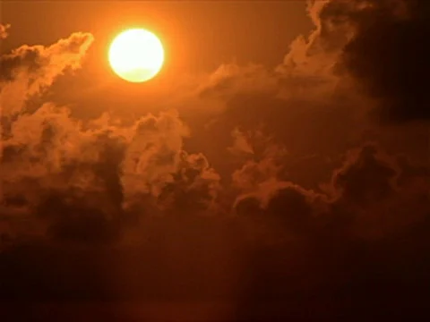 Sunset through Dark Clouds 320x240 Stock Footage 524588