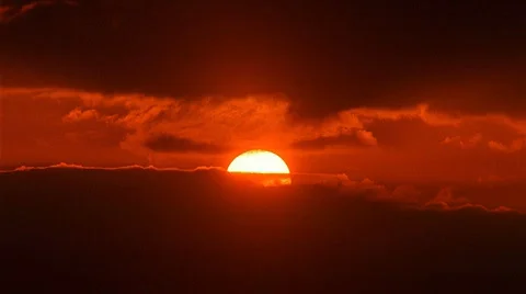 Sunset through Dark Clouds 480x270 Stock Footage 524611