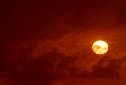 Sunset through Fiery Red Clouds NTSC Video stock 530344