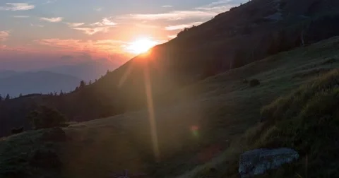 Sunset Through Flowing Cloud Waves, Mountain Time Lapse Pan Stock Footage 65412062