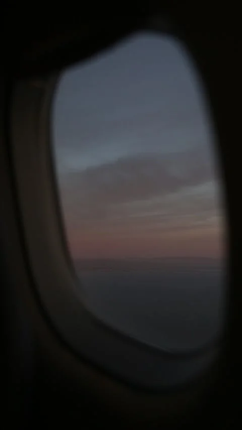 Sunset Through the Plane Window Stock Footage 171893498