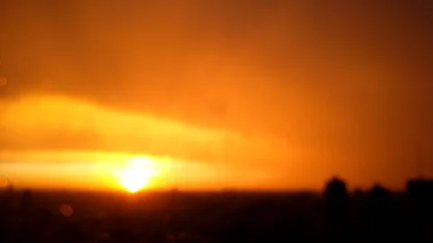 Sunset through rainy window - wonderful golden colors Stock Footage