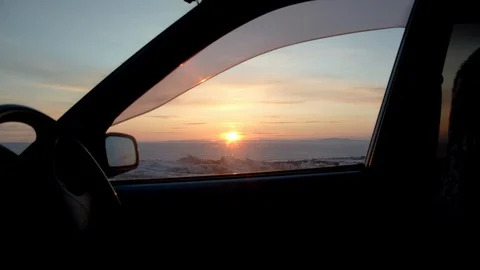 Sunset through a window of a car in winter in siberia Stock Footage 129065864