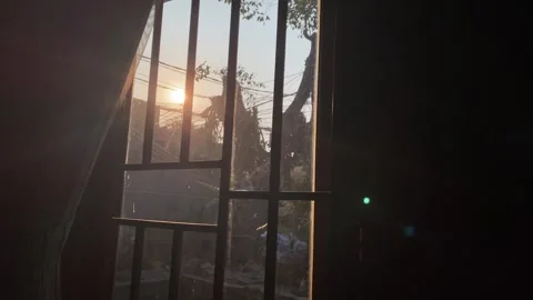 Sunset through window Video stock 343357541