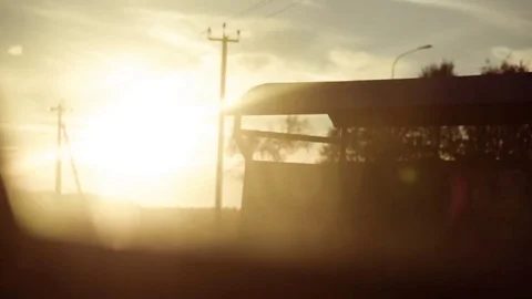 Sunset through a window of a moving car Stock-Footage 75934394