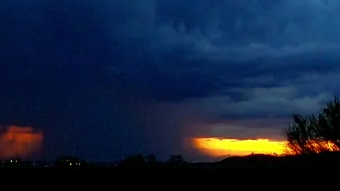 Sunset thunderstorm with lightning strikes - Tucson, Arizona Stock Footage 246708185