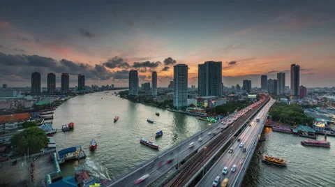 Sunset till night bangkok river traffic bridge roof view 4k time lapse thailand Stock Footage